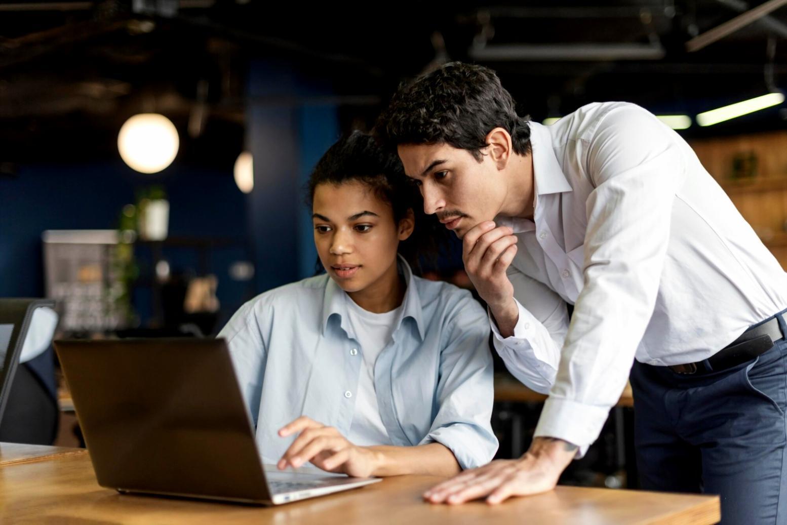 One-on-one business consultation discussing financial strategies